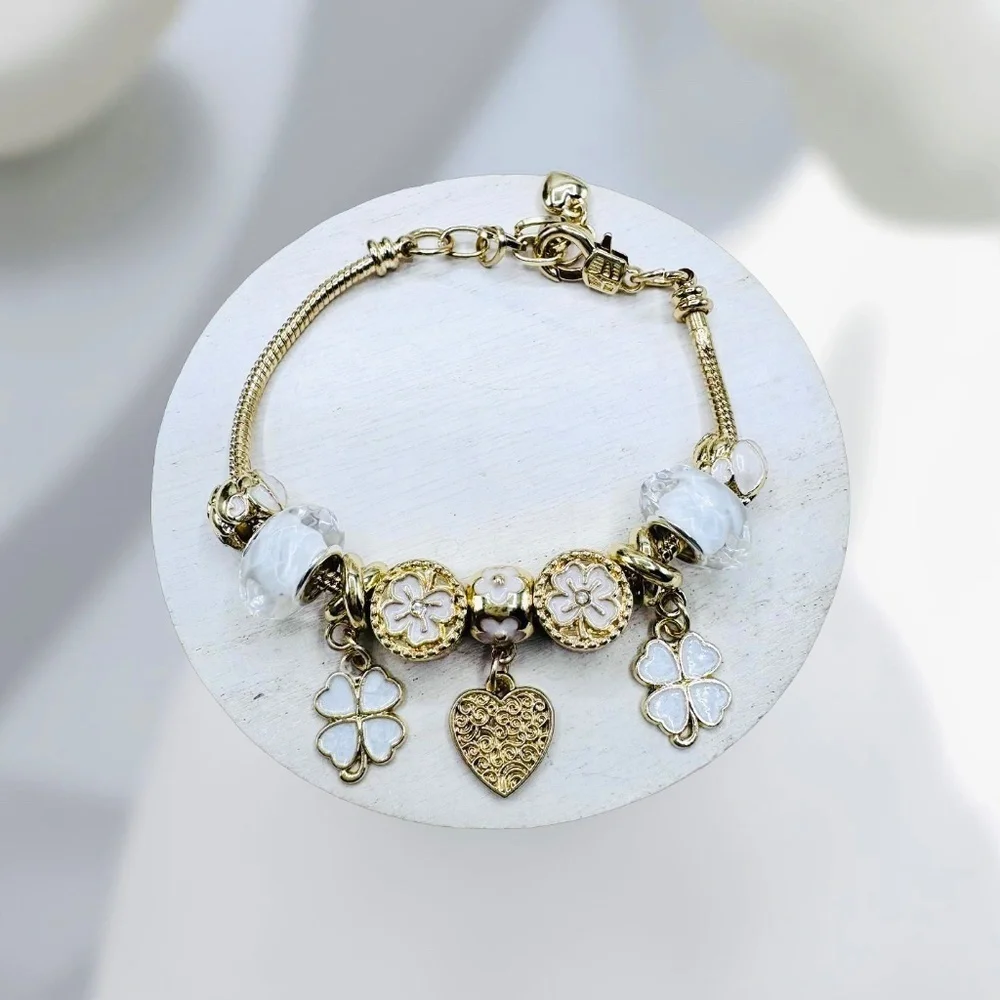 The Heart of Charms: Flower & Heart Charms Bracelet